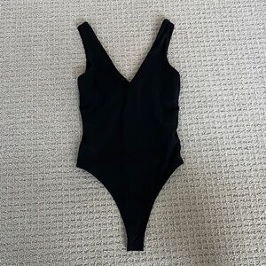 Vuori Black V-Neck Bodysuit